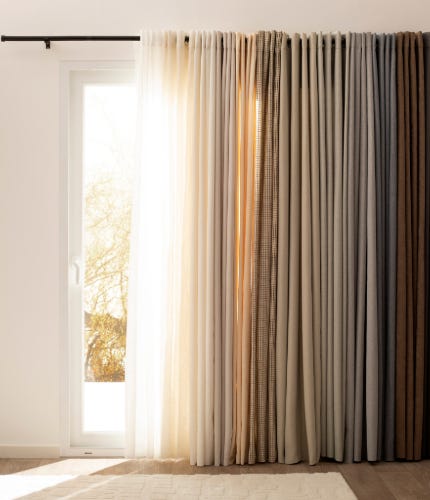 Elegir cortinas para el living